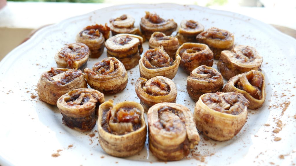 Raw vegan cinnamon rolls with chocolate filling 